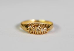 18ct GOLD RING with a lozenge shaped setting of five tiny diamonds, Birmingham 1911, 2.2gms, ring