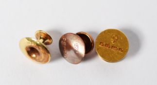TWO 18ct GOLD DRESS STUDS and one 15ct gold dress stud, in case, 2.9gms in total (3)