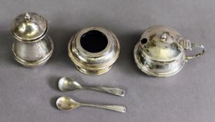 GEORGE V BOXED PAIR OF SILVER SALT AND PEPPER POTS, of capstan form, with steel bases, the salt with