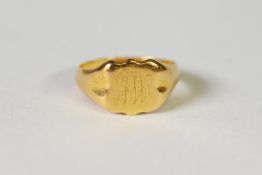 GENT'S 22ct GOLD SIGNET RING, the cartouche shaped top initialled J.W., 7.2gms, ring size R/S