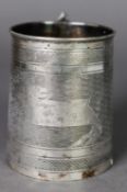 EDWARD VII ENGINE TURNED SILVER CHRISTENING MUG, of tapering form with leaf capped scroll handle and