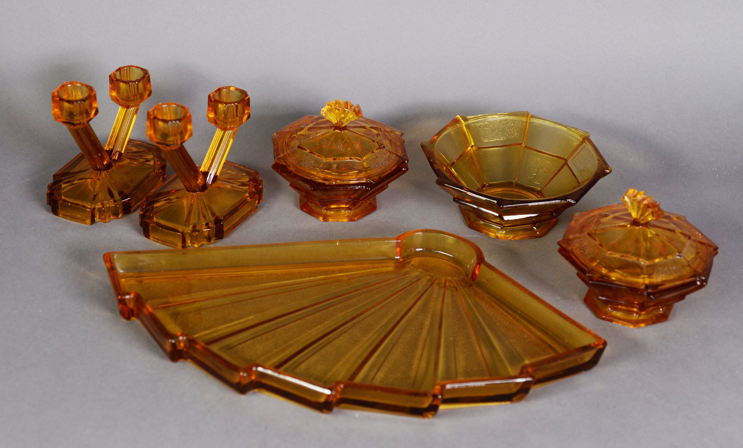 AMBER GLASS ART DECO DRESSSING TABLE SET of 6 pieces, including a fan shaped tray and a pair of