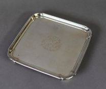 GEORGE II ARMORIAL CRESTED SILVER WAITER BY MATHEW COOPER, of square form with inset rounded