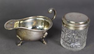 EARLY 20th CENTURY SILVER SAUCE BOAT, with flying-scroll handle, beaded rim and three palmette-