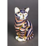 ROYAL CROWN DERBY PAPERWEIGHT, in the form of an Imari decorated seated cat, with gold button, 5” (