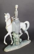 LLADRO, SPANISH PORCELAIN LARGE EQUESTRIAN GROUP, modelled as a young lady riding side saddle,
