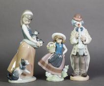 THREE LLADRO FIGURE GROUPS, Saxophone Clown, Crazy Cat Lady, and Girl with Basket of Flowers; 9 5/8"