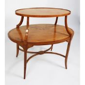 AN EDWARD VII MAHOGANY AND SATINWOOD ETAGERE, of two graduated oval tiers, with cross banded