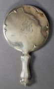 EDWARD VII SILVER CLAD LADY’S DRESSING TABLE HAND MIRROR, with bevel edged circular plate,