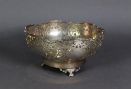 PIERCED SILVER FRUIT BOWL, with floral and scroll pierced sides, shaped border and paw feet, 4 ½” (