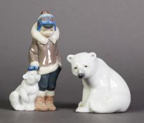 TWO LLADRO, SPANISH PORCELAIN FIGURES, one modelled as an ESKIMO BOY STANDING NEXT TO A SEATED POLAR