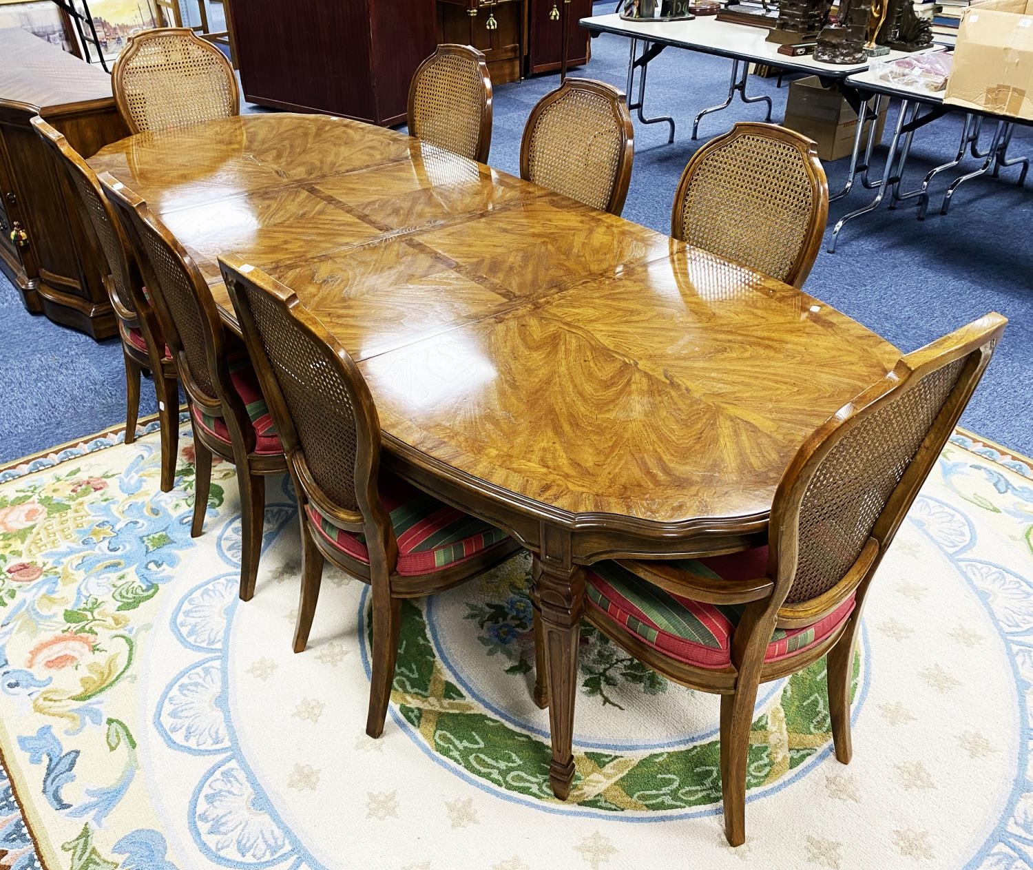 A DINING ROOM SUITE OF TEN PIECES, comprising 8 chairs, including a pair of carver’s armchairs, with