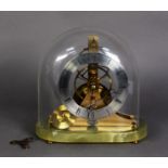 ‘DUNHILL' SMALL 2OTH CENTURY BRASS SKELETON CLOCK, with silvered chapter ring, on green onyx base, 8