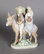 LLADRO, Spanish porcelain group of a boy and girl riding on a donkey, on oval base, 7 ½” (19 cm) H