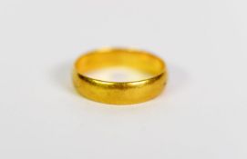 GOLD COLOURED METAL BROAD WEDDING RING, 3.4gms