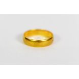 GOLD COLOURED METAL BROAD WEDDING RING, 3.4gms