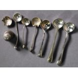 GEORGE V SILVER THIMBLE, Birmingham 1926, together with FOUR SILVER CONDIMENT SPOONS, one lacking