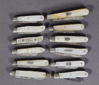 TWELVE VICTORIAN AND LATER SILVER BLADED SMALL FOLDING POCKET KNIVES WITH MOTHER OF PEARL CLAD