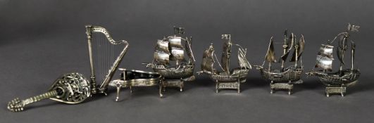 FOUR STERLING SILVER MODELS OF THREE MASTED SAILING SHIPS, stamped S. MARIA, NINA and PINTA,