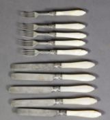 VICTORIAN SET OF TWELVE SILVER DESSERT KNIVES AND FORKS WITH CARVED MOTHER OF PEARL HANDLES BY