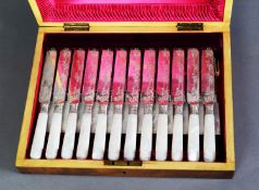 EDWARD VII CASED SET OF TWELVE SILVER DESSERT KNIVES AND FORKS WITH MOTHER OF PEARL HANDLES BY