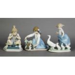 THREE LLADRO FIGURE GROUPS, Girl with Geese and Goslings, Bedtime for Bloodhound, and Girl with