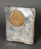 EDWARD VII EMBOSSED SILVER FRONTED PHOTOGRAPH FRAME, with oak back and easel support, decorated with