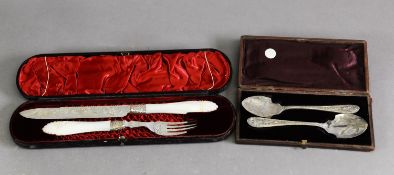 CASED VICTORIAN ELECTROPLATED CAKE SERVING KNIFE AND FORK, with engraved blade and carved mother