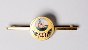 15ct GOLD BAR BROOCH with disc centre enamelled with a large yacht and monogram, 5.5gms