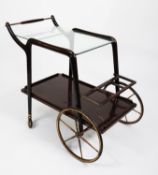 BROWN METAL FRAMED COCKTAIL TROLLEY with glass tops, with large and small wheels