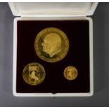 WINSTON CHURCHILL ‘THIS WAS THEIR FINEST HOUR’ CASED COMMEMORATIVE SET OF THREE GOLD MEDALLIONS, 71g