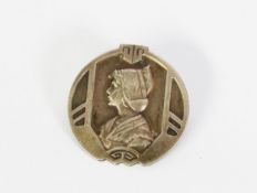 CONTINENTAL SECESSIONIST STAMPED SILVER (800 standard) CIRCULAR BROOCH depicting a bust of a woman