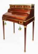 FRENCH EMPIRE STYLE BUREAU DE DAME, the raised back with grey marble top having pierced brass