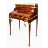 FRENCH EMPIRE STYLE BUREAU DE DAME, the raised back with grey marble top having pierced brass