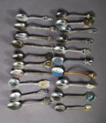COLLECTION OF THIRTY NINE ELECTROPLATED OR CHROME PLATES SOUVENIR SPOONS, (39)
