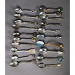 COLLECTION OF THIRTY NINE ELECTROPLATED OR CHROME PLATES SOUVENIR SPOONS, (39)