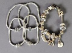 STERLING BRACELET, the clasp marked Pandora, with 17 threaded on charms and 4 other SMALL CHARM