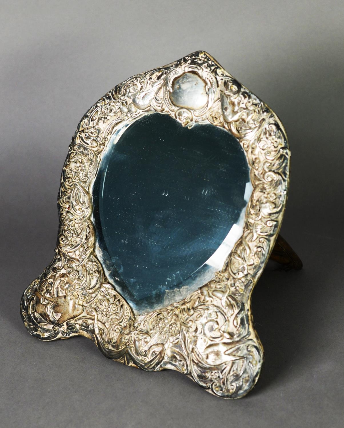 EDWARD VII EMBOSSED SILVER FRONTED DRESSING TABLE MIRROR, with bevel edged heart shaped plate and