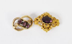 MID-VICTORIAN GOLD PLATED OPENWORK ROCOCO SCROLL BROOCH, quatrefoil set with a centre oval amethyst,