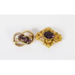 MID-VICTORIAN GOLD PLATED OPENWORK ROCOCO SCROLL BROOCH, quatrefoil set with a centre oval amethyst,