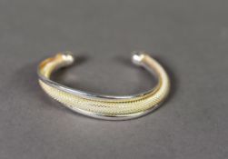 TIFFANY SILVER TORQUE BANGLE, two strands enclosing a silver lace cylindrical tube, domed terminals,