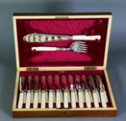 CASED SET OF TWELVE PAIRS OF ELECTROPLATED FISH EATERS AND MATCHING PAIR OF FISH SERVERS BY WALKER &