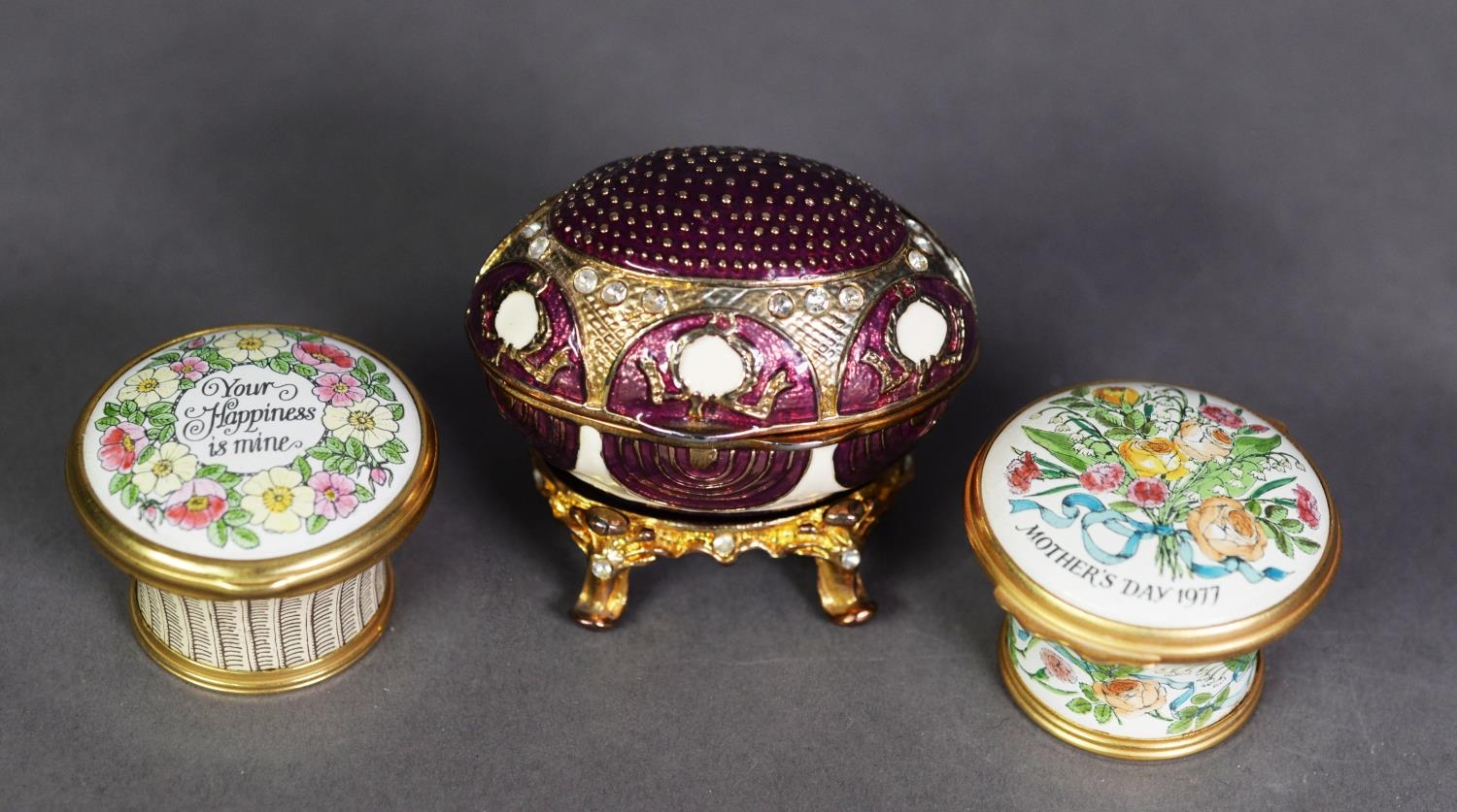 TWO HALCYON DAYS ENAMELLED ‘MOTHER’S DAY’ SMALL BOXES with hinged lids and an enamelled and a gilt