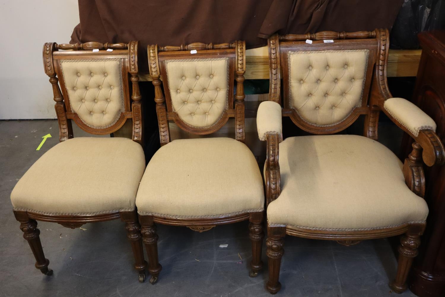 A SET OF NINE LATE VICTORIAN WALNUT DINING CHAIRS, WITH SCROLL TOPS, FITTED WITH OVERSTUFFED SEATS