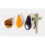 BUTTERSCOTCH AMBER TEAR SHAPED PENDANT; a tiger's eye pebble PENDANT; an amethyst tear shaped