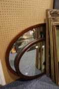 EDWARDIAN MAHOGANY FRAMED OVAL WALL MIRROR, 38" (96.5CM) LONG AND A SMALLER DITTO (FROM A DRESSING