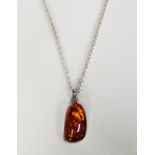 SILVER CHAIN NECKLACE with large cabochon amber pendant in silver frame