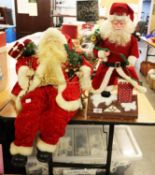 TWO FATHER CHRISTMAS DECORATIONS, ONE BATTERY OPERATED; A QUANTITY OF CHRISTMAS DECORATIONS TOGETHER