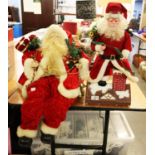 TWO FATHER CHRISTMAS DECORATIONS, ONE BATTERY OPERATED; A QUANTITY OF CHRISTMAS DECORATIONS TOGETHER