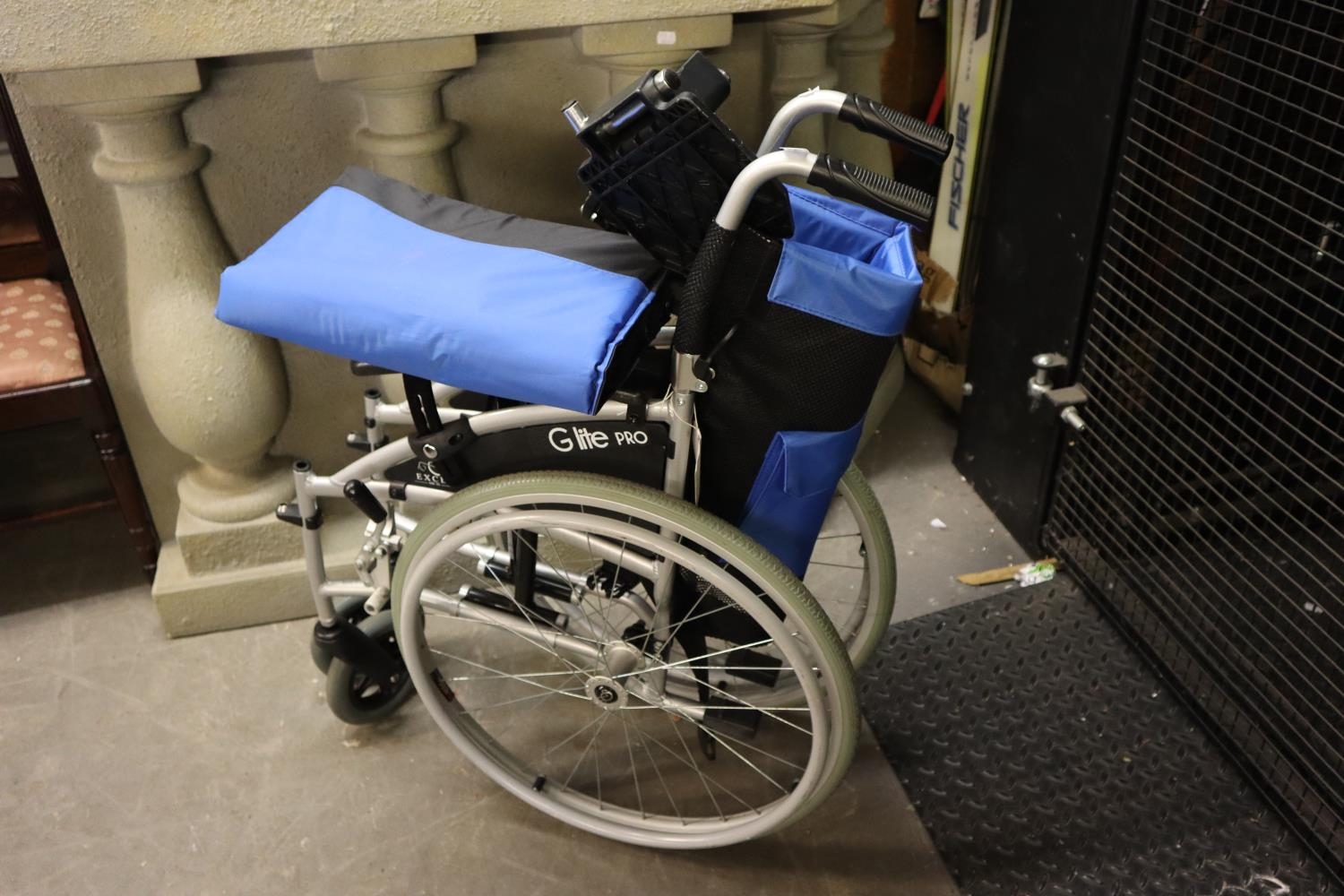 A G-LITE PRO BY EXCEL WHEELCHAIR IN GOOD USED CONDITION